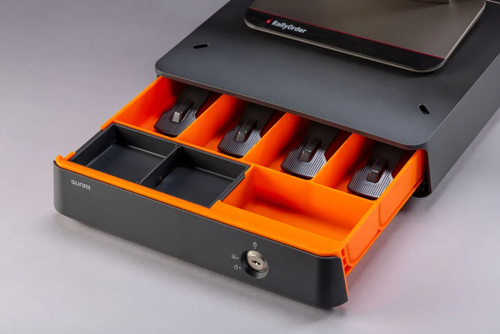 Open cash drawer with coin and bill tray